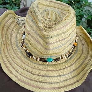 Maurice's straw hat with beaded accents